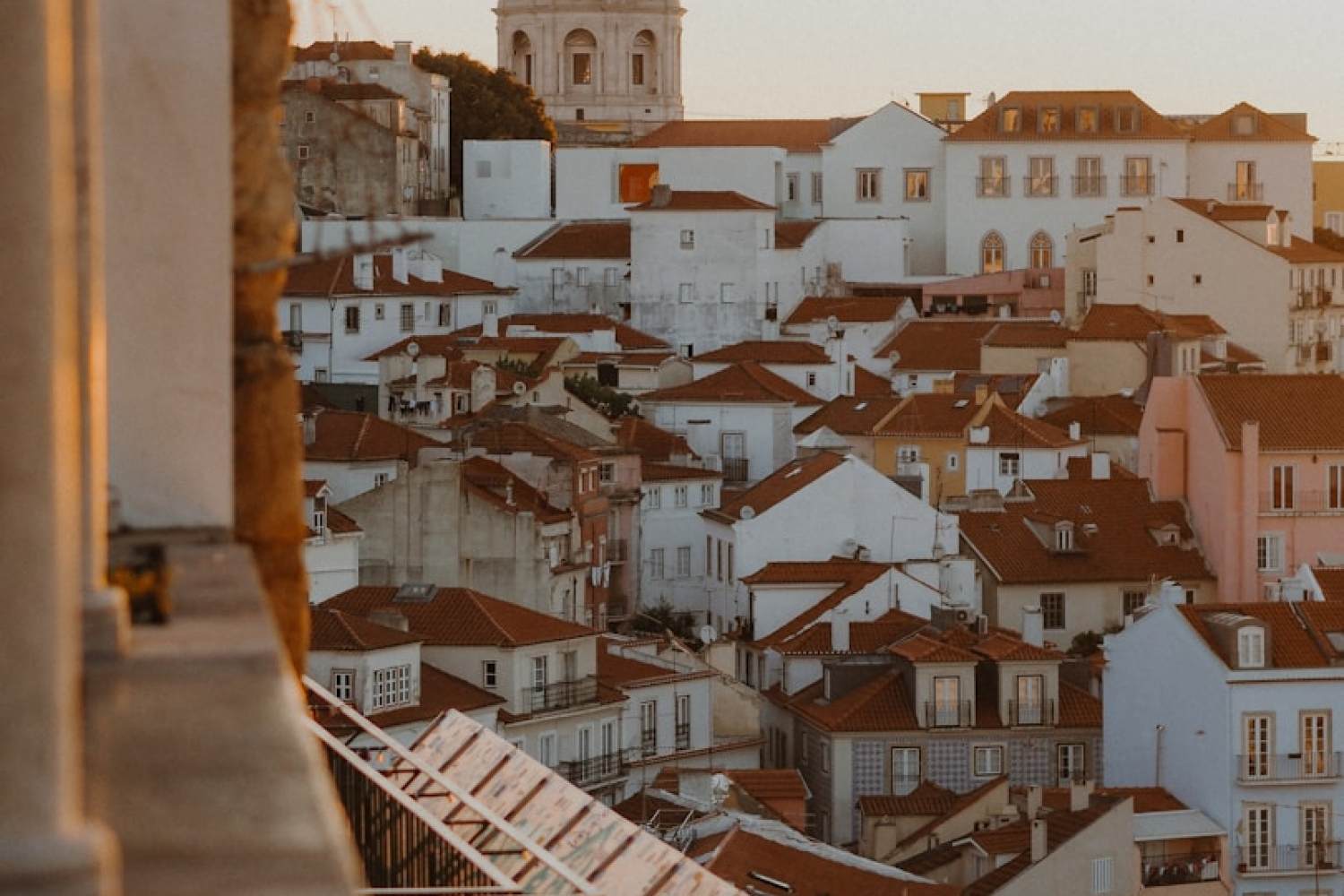 white and brown concrete building during daytime. Healthy Buildings Lisbon