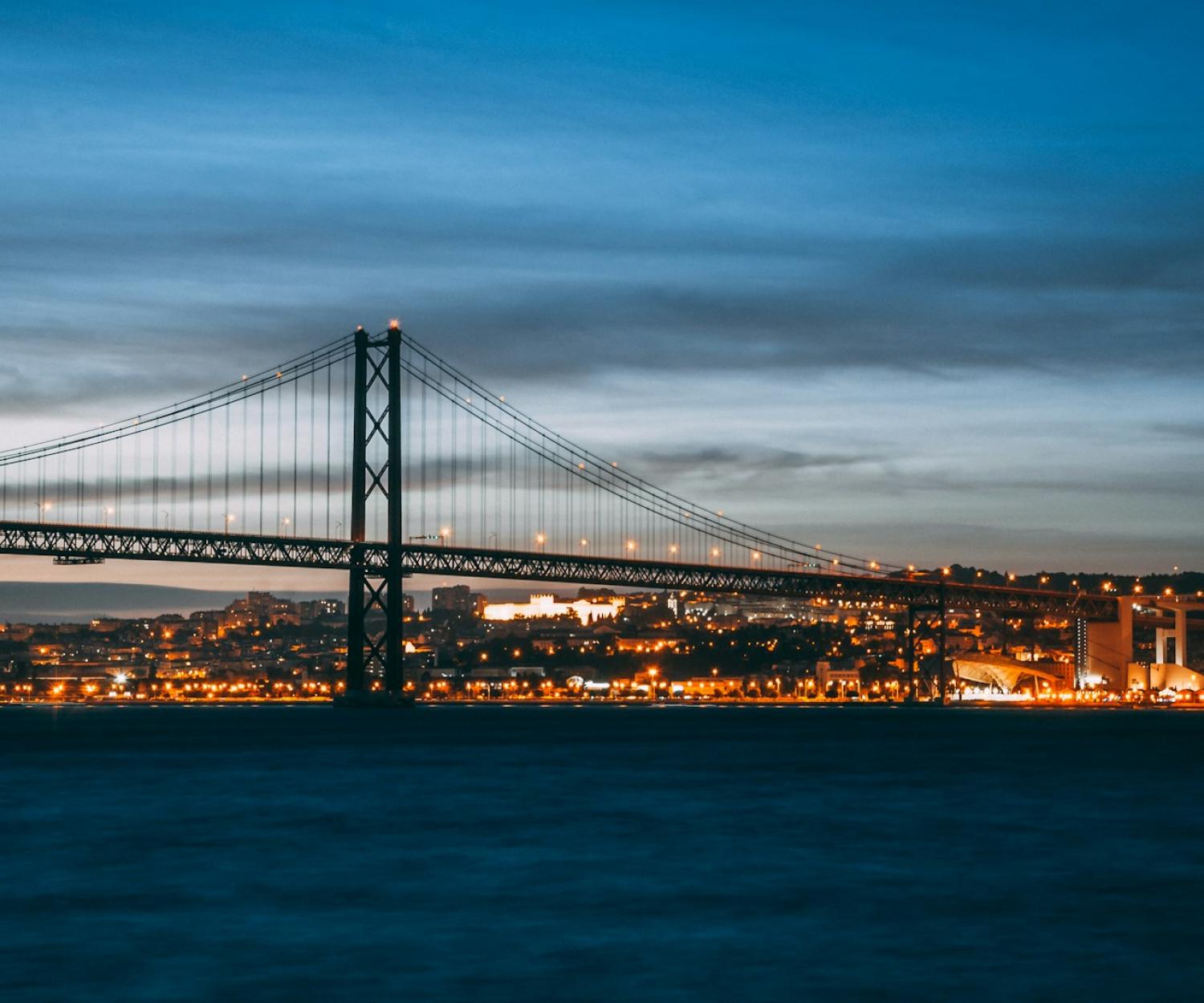 concrete bridge at night time